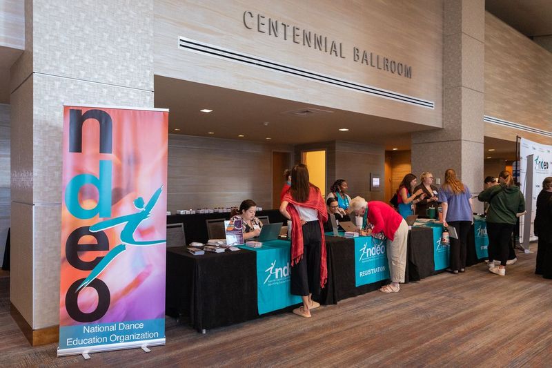Registration desk with NDEO logo at the 2023 national conference